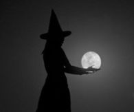 Witch holding the moon