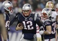 Tom the Great passes for 30 of 35 with 5 TDs SETTING THE RECORD