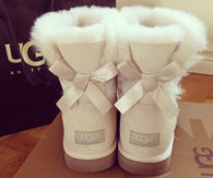 White bow ugg boots