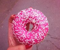 Pink white sprinkled donut