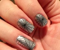 Silver spider web nails