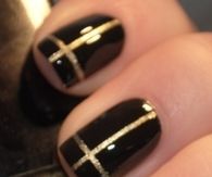 Black gold cross nails