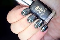 Dotted black nails