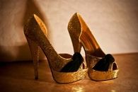 Gold Glitter Pumps with Black Bows