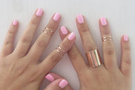 pink nails and jewelry