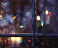 Christmas lights by the window