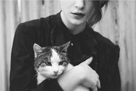 Cat in Parents arms