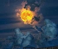 Amazing clouds and fiery moon