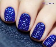 Navy blue glitter nails
