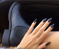 Matte black stiletto nails