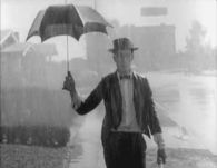 Stan Laurel in the rain