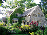 English Cottage with Ivy, Bird Niches and Surrounded by an English Garden