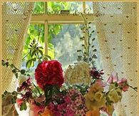 Flowers in Antique Pitcher