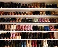 Closet of boots, heels and shoes