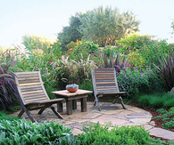 Lush slate patio garden