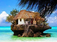 House on a rock in the Ocean
