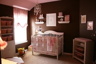 Pink and brown baby room for girls