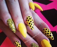 Yellow polka dot nail designs