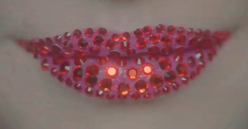 Smiling lips with gems