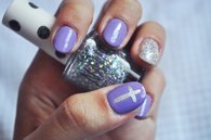 Glitter purple cross nails