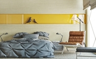 Yellow vibrant glass bedroom