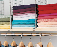 Shelf dividers in a closet
