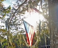 American flag in the sun