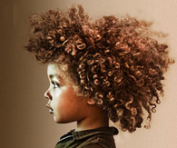 Kid with big curly hair