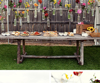 Flowers in hanging glass bottles