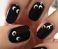 Spooky eyes nail art