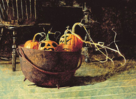 Jack o lanterns in the cauldron