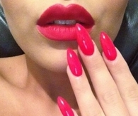 Hot pink lips and stiletto nails