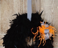 Dramatic black feather wreath