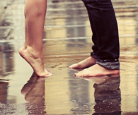 Barefoot Couple In The Rain