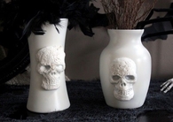 Pottery barn skull vases