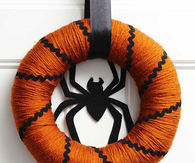 Orange and black spider wreath