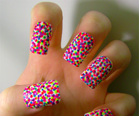 Rainbow polka dot nails