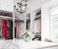 White clean walk in closet