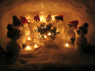 Snowmen around the tree