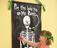 Pin the bow tie on the skeleton game