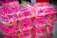 Pink sprinkled donuts