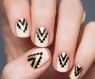Gold and black aztec nails