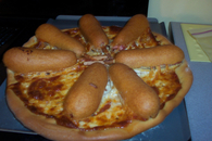 Corn dog pizza