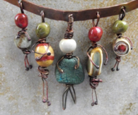 Tiny bead people pendants