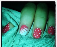 Pink and white polkadot nails