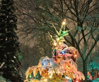 Small christmas tree in the snow