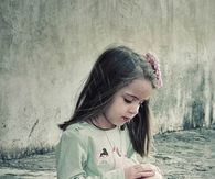 Little girl in the rain