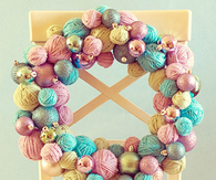 Yarn ball and ornament wreath