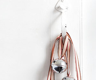 Jingle bells hanging from doorknob