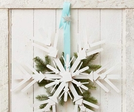Wooden snowflake door decoration